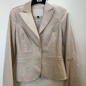 Bebe Blazer size 2. Never worn .